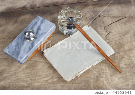 Old fountain pen and inkwell with old letters 44958641