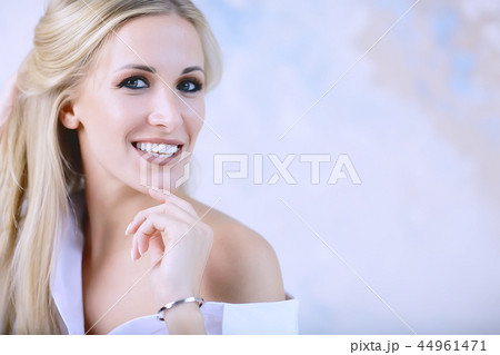 model makeup smile / beautiful professional model with makeup smiling in studio model makeup smile / beautiful professional model with makeup smiling in studio 44961471