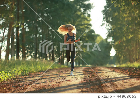 summer girl running nature / young adult athletic slender girl jogging, nature, freshness beauty summer summer girl running nature / young adult athletic slender girl jogging, nature, freshness beauty summer 44963065