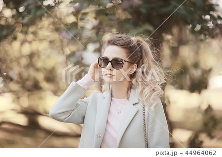summer photo adult girl / beautiful blonde on summer photo, concept of summer female happiness 44964062