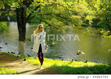 vintage adult girl summer tint / happy adult woman having fun and enjoys summer summertime girl 44964704