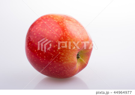 Fresh red apple on white background 44964977