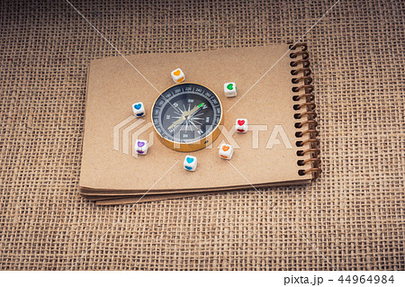 Heart cubes around a compass 44964984