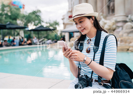 traveler sitting beside clean pool in Las Vegas traveler sitting beside clean pool in Las Vegas 44966934
