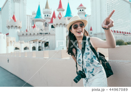 photographer pointing at the beauty of the sky photographer pointing at the beauty of the sky 44967089