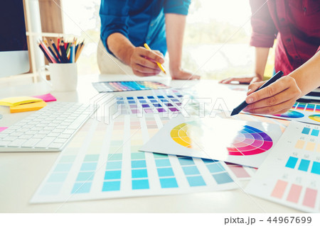 Graphic designer drawing on graphics tablet  44967699