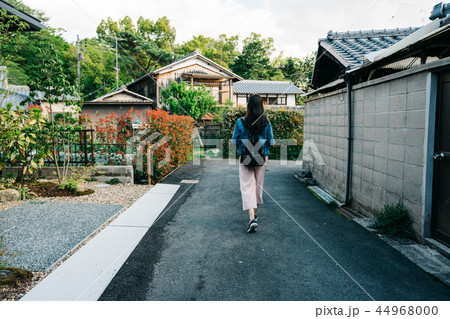 traveler relaxing walking through the garden traveler relaxing walking through the garden 44968000