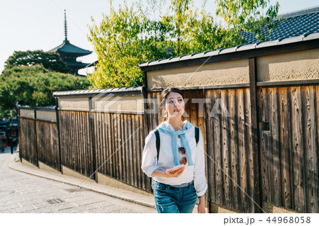 female tourist walking around the wall 44968058