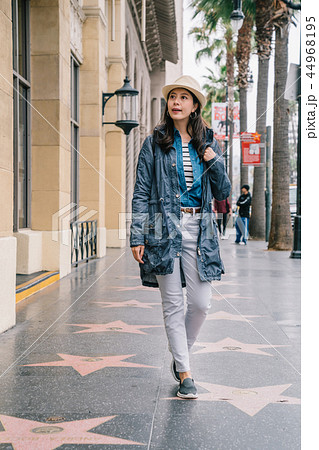 a beautiful lady window shopping 44968195