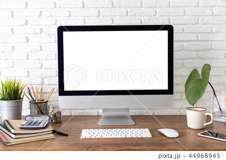 workspace with computer with blank white screen workspace with computer with blank white screen 44968945