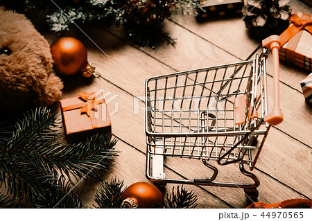 shopping cart and christmas decorations 44970565