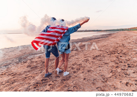 american couple with hand flare or fusee 44970682