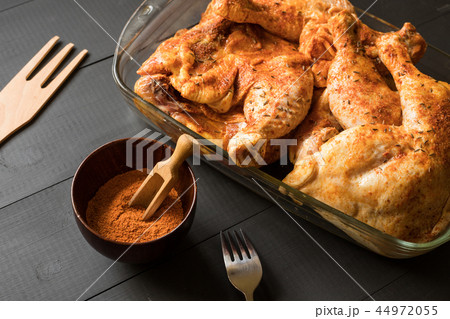 tasty chicken legs before roast 44972055
