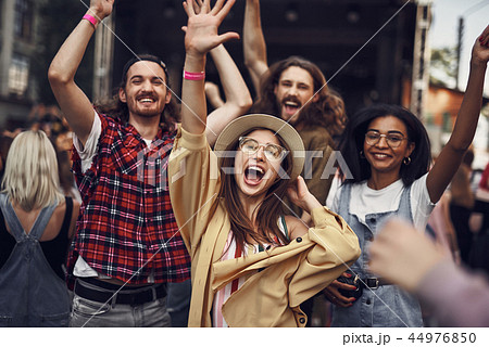 Group of hipster friends having fun at outdoor music concert 44976850