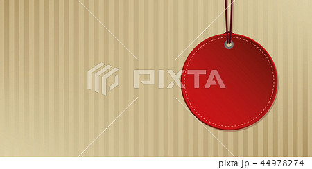 red hanging label on abstract paper background red hanging label on abstract paper background 44978274