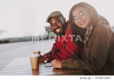 Cute young people smiling while looking at you Cute young people smiling while looking at you 44981987