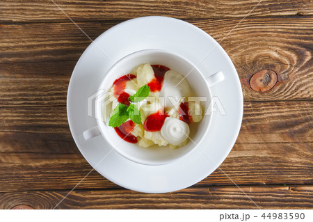 lazy dumplings with sour cream and strawberry jam lazy dumplings with sour cream and strawberry jam 44983590