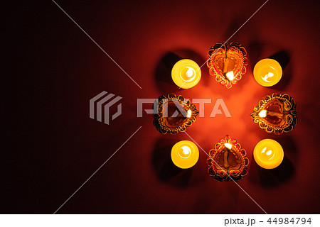 Happy Diwali - Clay Diya lamps lit during Dipavali 44984794