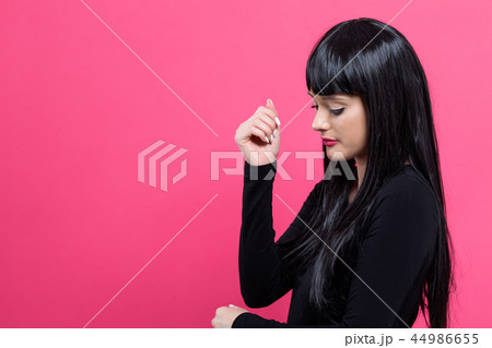 Beautiful fashionable young woman 44986655