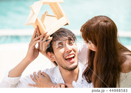 Young couple planning to buy a house concept. Young couple planning to buy a house concept. 44998583