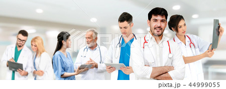 Doctor working in hospital with other doctors. Doctor working in hospital with other doctors. 44999055