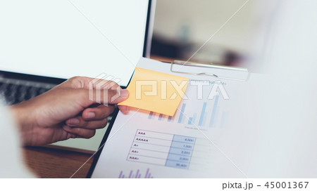 Business team working together at meeting. Business team working together at meeting. 45001367