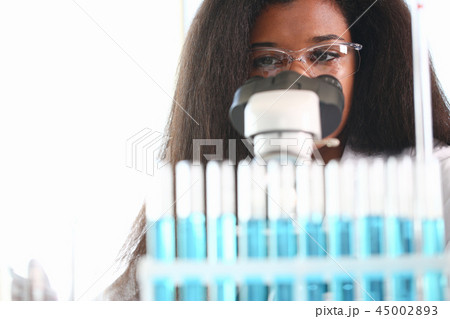 Black woman scientist student chemist in protective 45002893