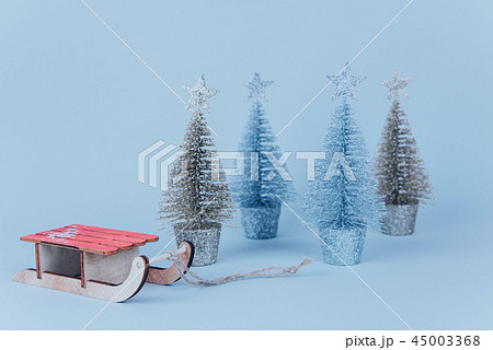 Stylish vintage wooden sled with xmas tree. 45003368