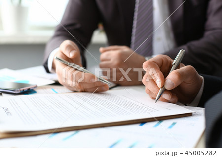 Male arm in suit and tie fill form clipped 45005282