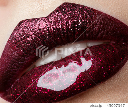 Close up view of beautiful woman lips 45007347
