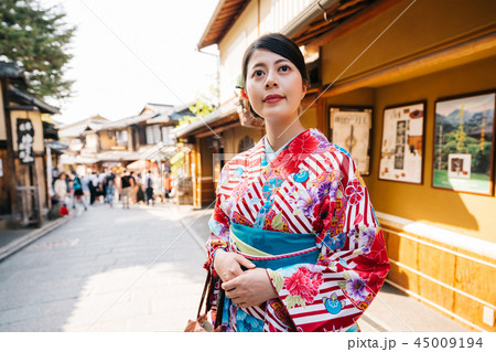 Japanese lady waiting for friends in old city 45009194