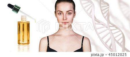 Cosmetic primer oil near beautiful woman with DNA chains. 45012025