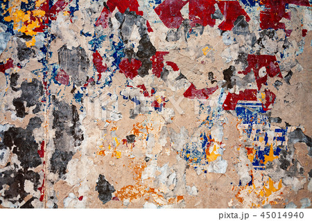 Bumpy plastered wall covered with mess of color spots Bumpy plastered wall covered with mess of color spots 45014940