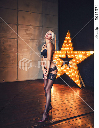 woman posing in black lace lingerie woman posing in black lace lingerie 45015574