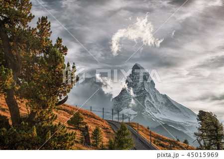 Matterhorn peak with railway in Swiss Alps 45015969
