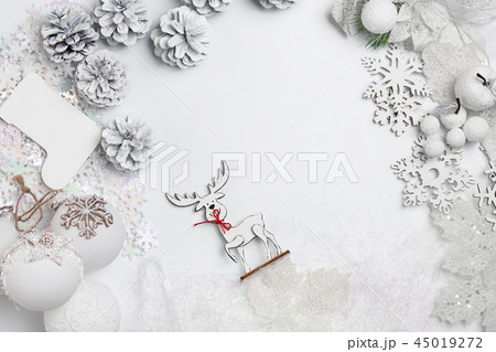 Christmas decorative composition of toys on a white background surrealism. Top view 45019272