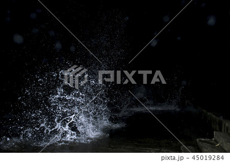 Splashing wave on the Black sea in the night. 45019284