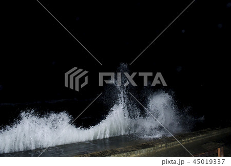 Splashing wave on the Black sea in the night. 45019337