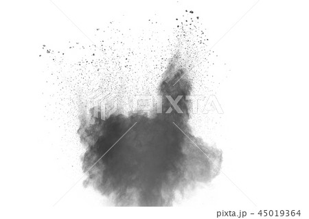 Black powder dust explosion on white background. Black powder dust explosion on white background. 45019364