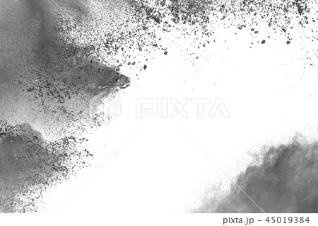 Black powder dust explosion on white background. Black powder dust explosion on white background. 45019384
