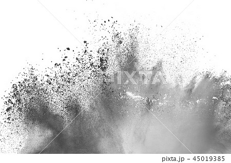 Black powder dust explosion on white background. Black powder dust explosion on white background. 45019385