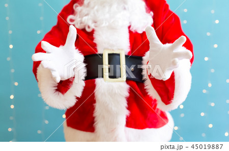 Santa with holding gesture 45019887