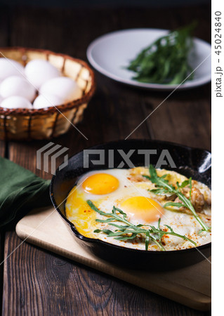 Countryside breakfast, roasted eggs with bacon Countryside breakfast, roasted eggs with bacon 45024840