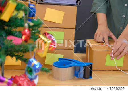 startup business owner packing cardboard box. man seller prepare parcel box for delivery. Online selling, e-commerce concept 45026295