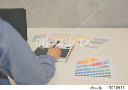 interior designer drawing on graphic tablet at office. artist working with computer at workplace. photographer retouch photo. design creativity concept 45026956