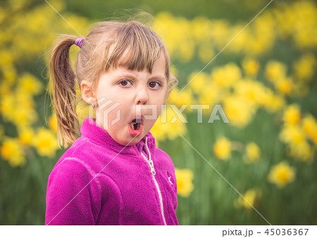 Portrait of a young mischievous girl 45036367