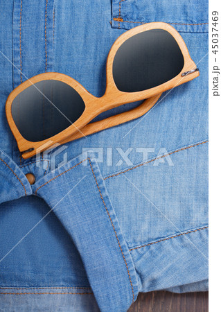 Classic shirt with sunglasses for a male image Classic shirt with sunglasses for a male image 45037469