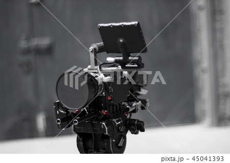 Professional cinema digital video camera on a tripod. 45041393