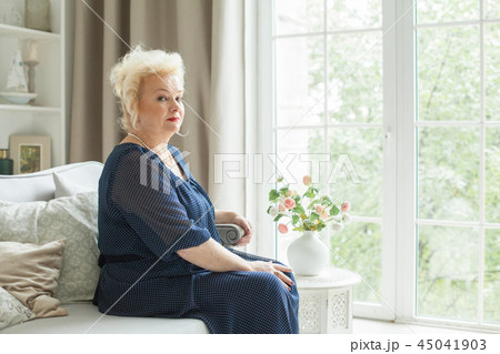 Portrait of beautiful senior woman at home 45041903