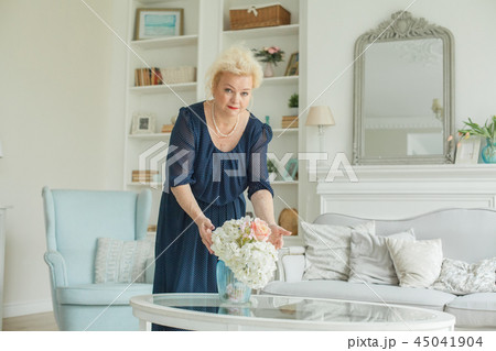 Senior woman portrait. Real older woman at home Senior woman portrait. Real older woman at home 45041904